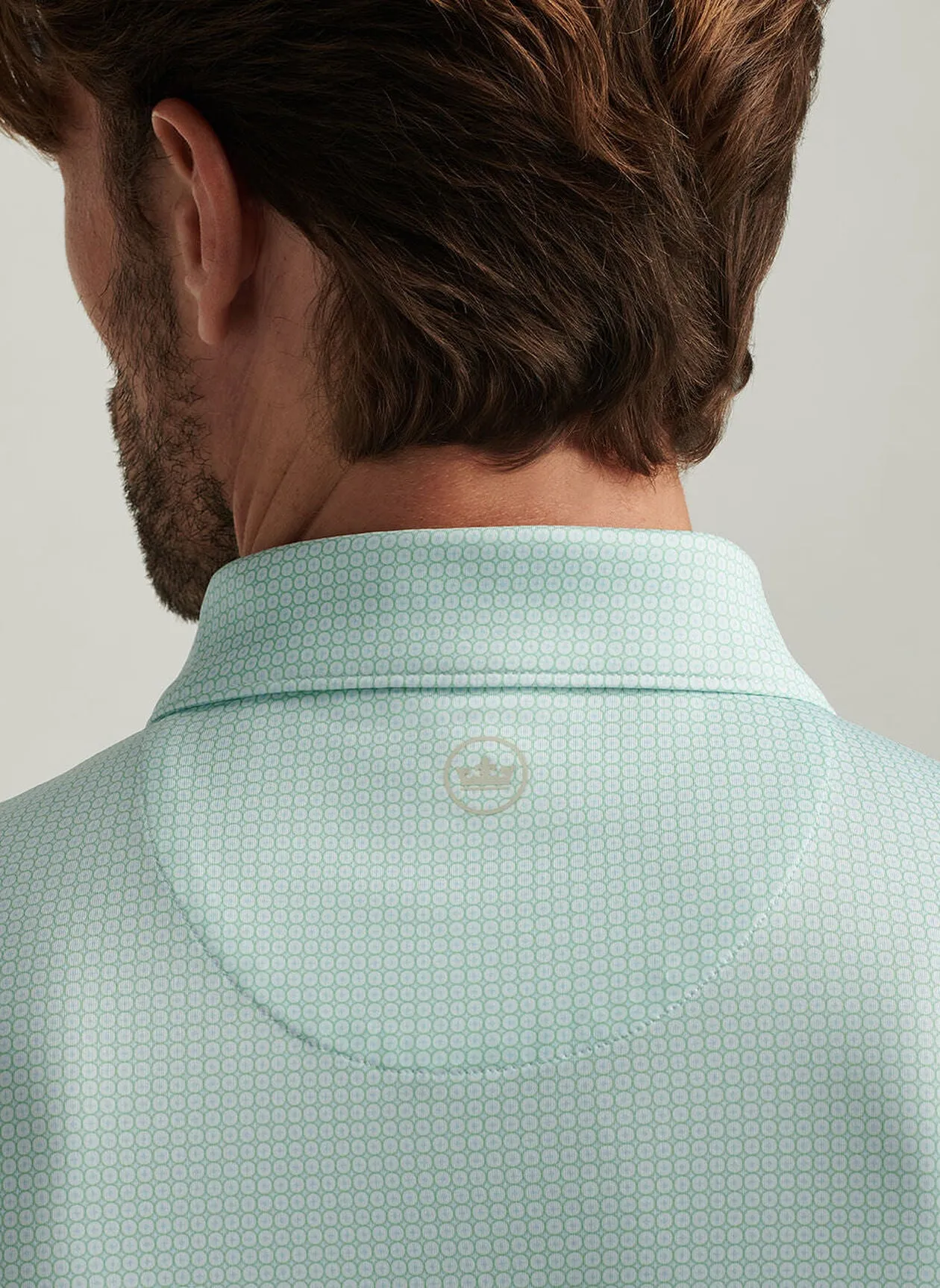 Orbit Performance Jersey Polo by Peter Millar - White w/ Pear Tart